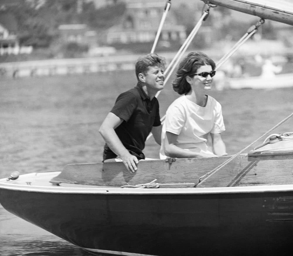 In this Aug. 7, 1960, file photo, Sen. John F. Kennedy and wife Jacqueline sail in the family sailboat, Victura, off the Cape Cod shore at Hyannis, Mass. (AP)