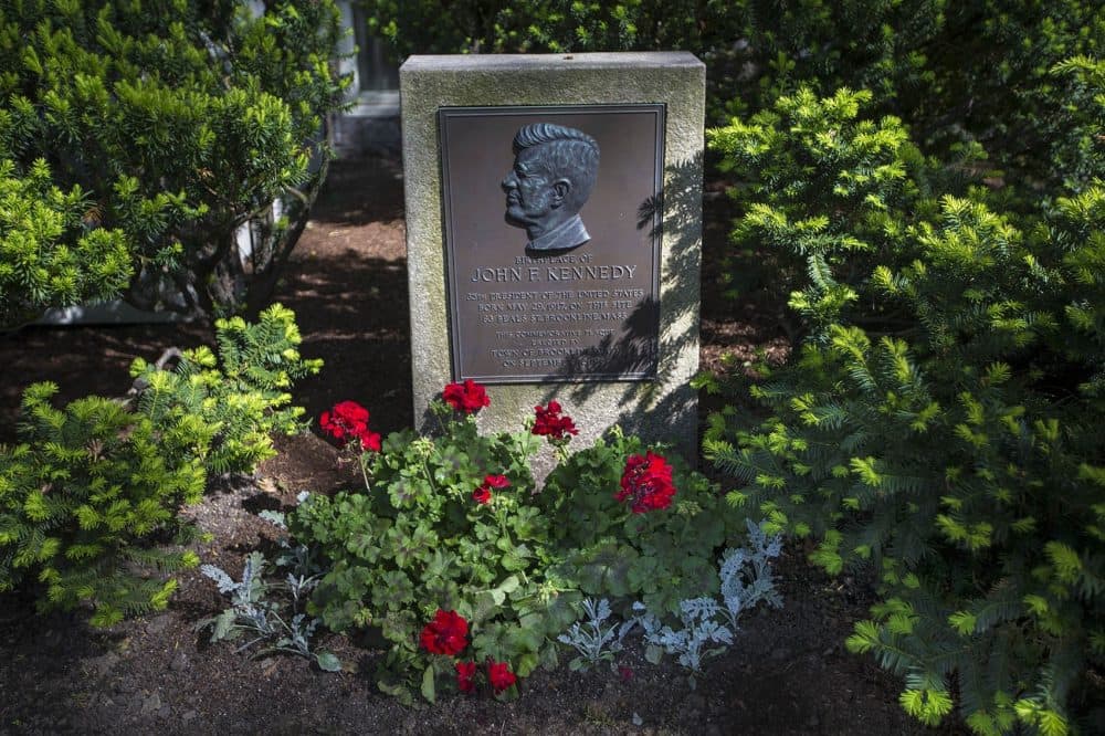 The plaque in the front yard of the John Fitzgerald Kennedy National Historic Site on Beals Street in Brookline. (Jesse Costa/WBUR)