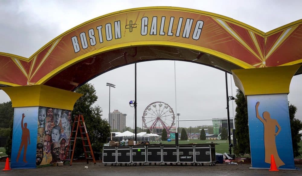 Construction of the entrance to Boston Calling is almost complete on a wet Thursday afternoon.(Robin Lubbock/WBUR)