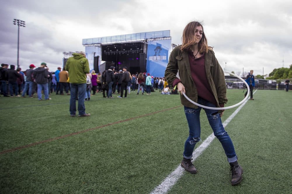 Arianna Leon, of Southwick, hula hooping during the Car Seat Headrest set at Boston Calling. (Jesse Costa/WBUR)