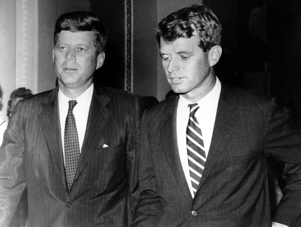 Then-Massachusetts Sen. John F. Kennedy, left, and his brother and campaign manager for the Democratic presidential nomination, Robert Kennedy, are shown together on July 10, 1960 in an unknown location. (AP)