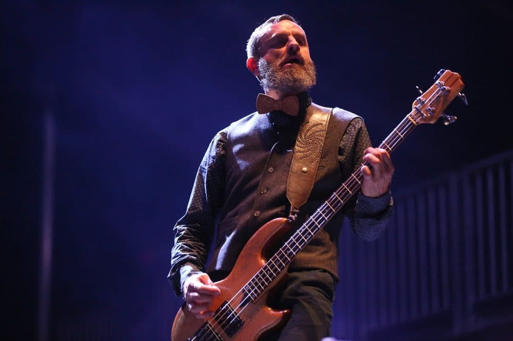 Tool's bassist Justin Chancellor. The alt-metal band closed out Boston Calling Sunday night. (Hadley Green for WBUR)
