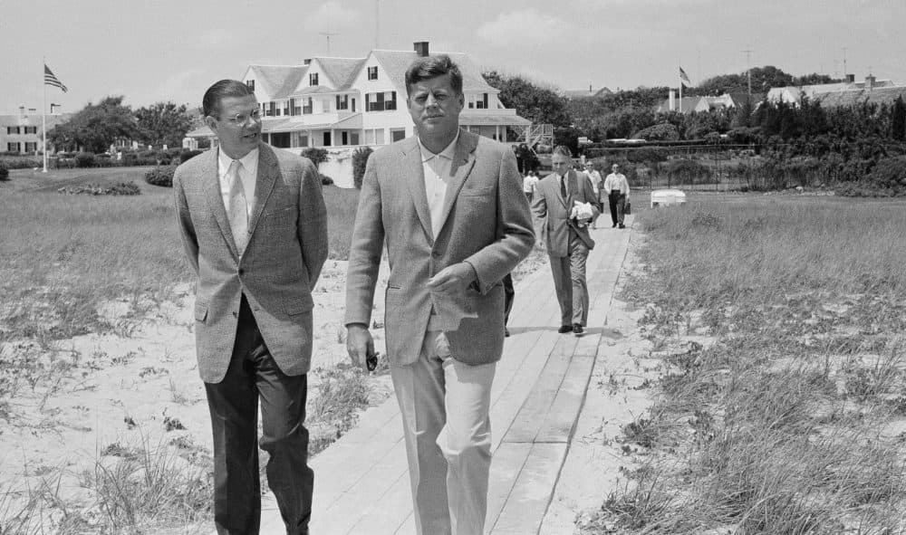 President John Kennedy, right, walks with Secretary of Defense Robert McNamara toward a pier on Cape Cod to board the Kennedy family boat for an outing in this file photo taken July 8, 1961, at Hyannisport, Mass. (John Rous, AP file)