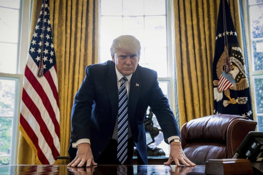 In the age of Donald Trump, writes John W. Mackey, it’s time to consider the real lessons of Watergate and the pardon of Richard Nixon. In this April 21, 2017, file photo, President Trump poses for a portrait in the Oval Office in Washington. (Andrew Harnik/ AP)
