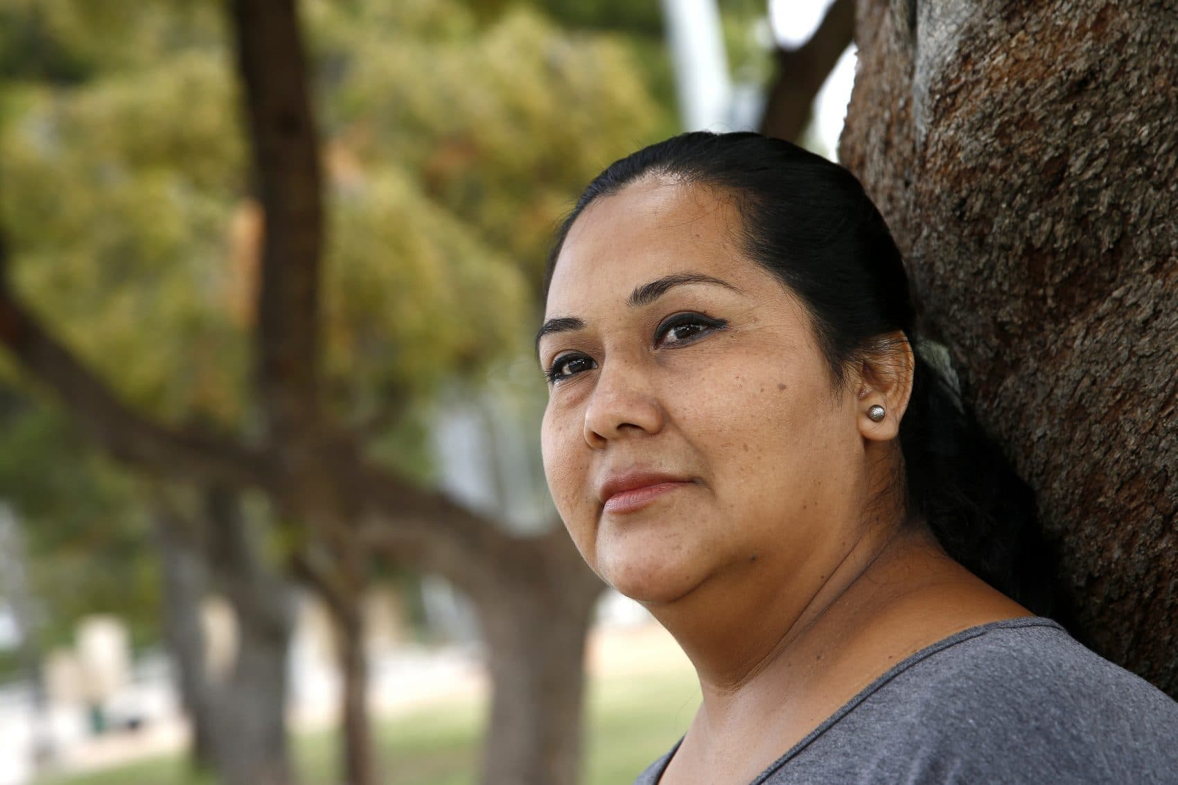 Blanca Chico, an uninsured patient who uses Planned Parenthood Arizona to get her health services, stands in a park near where she lives in Scottsdale, Ariz., on Tuesday, May 9, 2017. (Ross D. Franklin/AP)