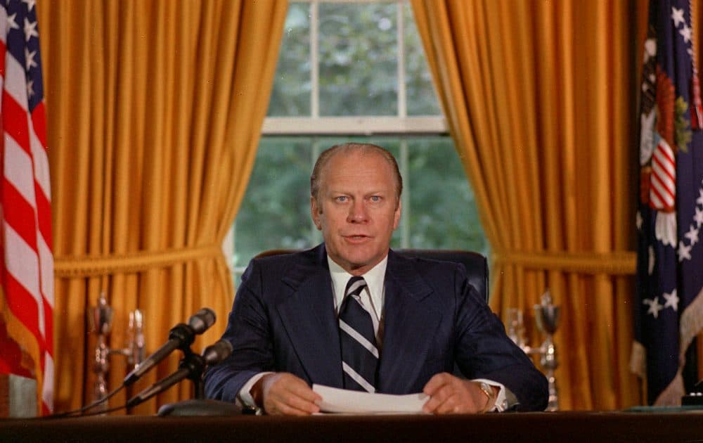 President Gerald Ford reads a proclamation in the White House on Sept. 8, 1974 granting former president Richard Nixon "a full, free and absolute pardon" for all "offenses against the United States" during the period of his presidency. (AP)