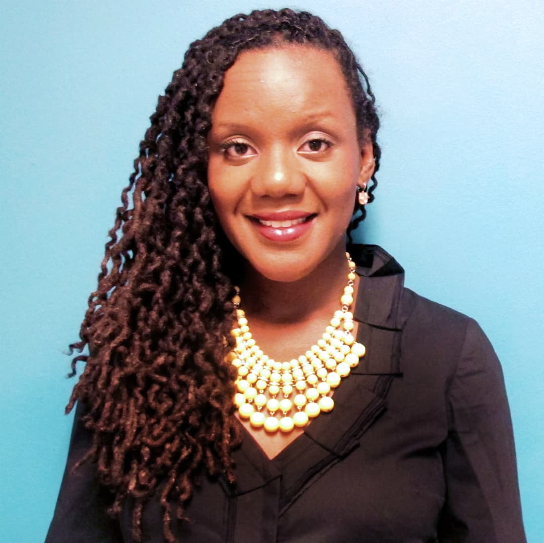Headshot of Régine Michelle Jean-Charles