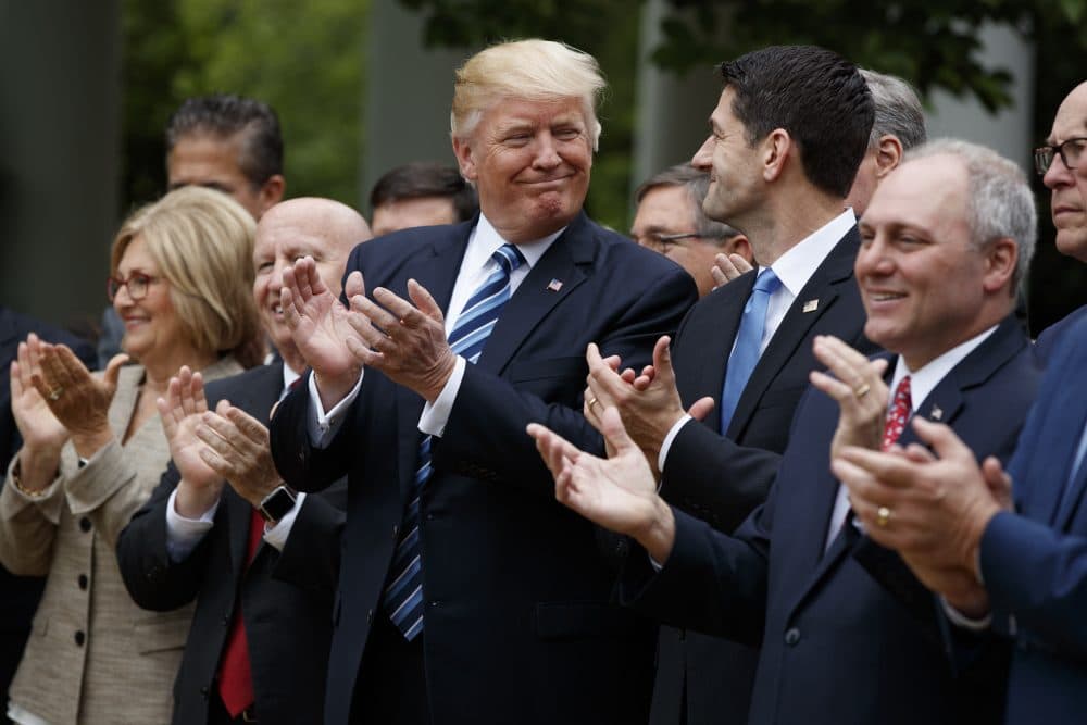 Let’s pretend we had a president who had carefully studied health care, writes Rich Barlow. What conservative, market-oriented, topflight health system might he pitch to the nation? Pictured: President Trump smiles at Rep. Paul Ryan after the House pushed through a health care bill. (Evan Vucci/AP)