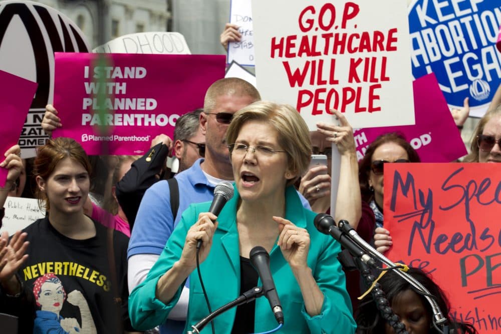 Sen. Elizabeth Warren speaks during a demonstration on Capitol Hill, Thursday, May 4, 2017, after the House pushed through the ACA replacement bill. (Jose Luis Magana/AP)