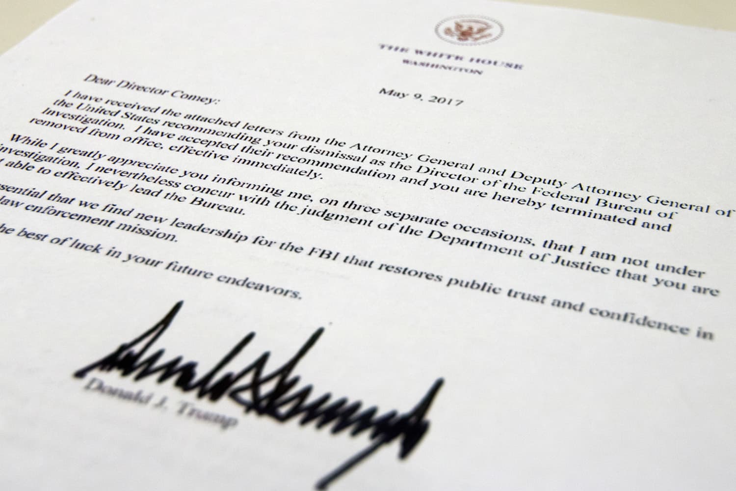 The termination letter from President Donald Trump to FBI Director James Comey is photographed in Washington (Jon Elswick/AP)