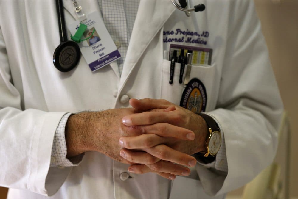 Doctors across the country are suffering from the effects of professional burnout. (Gerald Herbert/AP)
