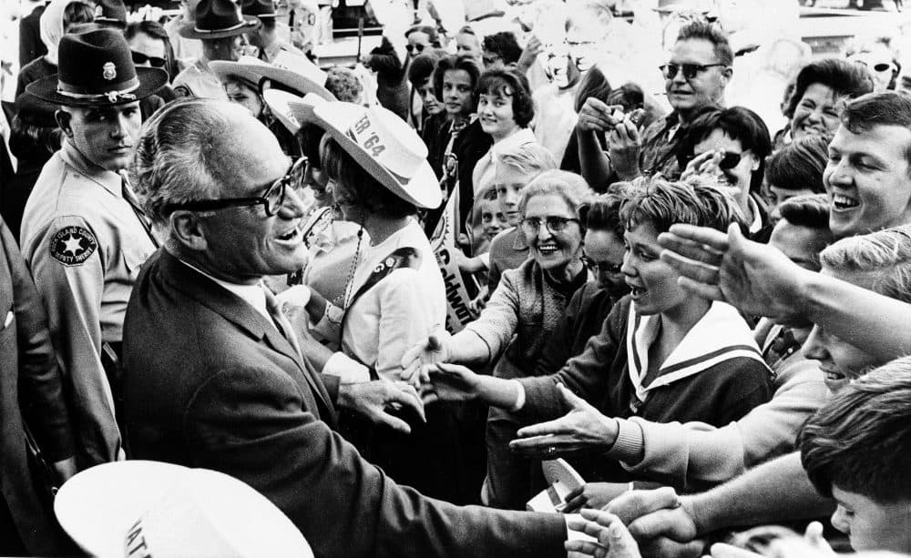 Republican presidential candidate Barry Goldwater greets supporters during a whistle-stop tour of Rock Island, Illinois, Oct. 3, 1964. (Henry Burroughs/AP)