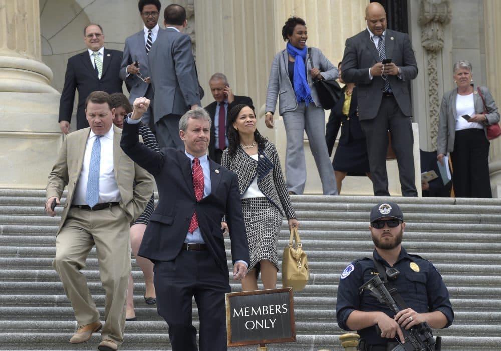 Not proposing an alternate health care bill will leave Democrats looking even more out-of-touch with the concerns of ordinary people, writes Miles Howard. Pictured: Rep. Matt Cartwright, D-Pa., responds to the protesters nearby as he and other Republican and Democratic House members walk down the steps of the Capitol in Washington, Thursday, May 4, 2017, after the Republican health care bill passed in the House. (Susan Walsh/AP)