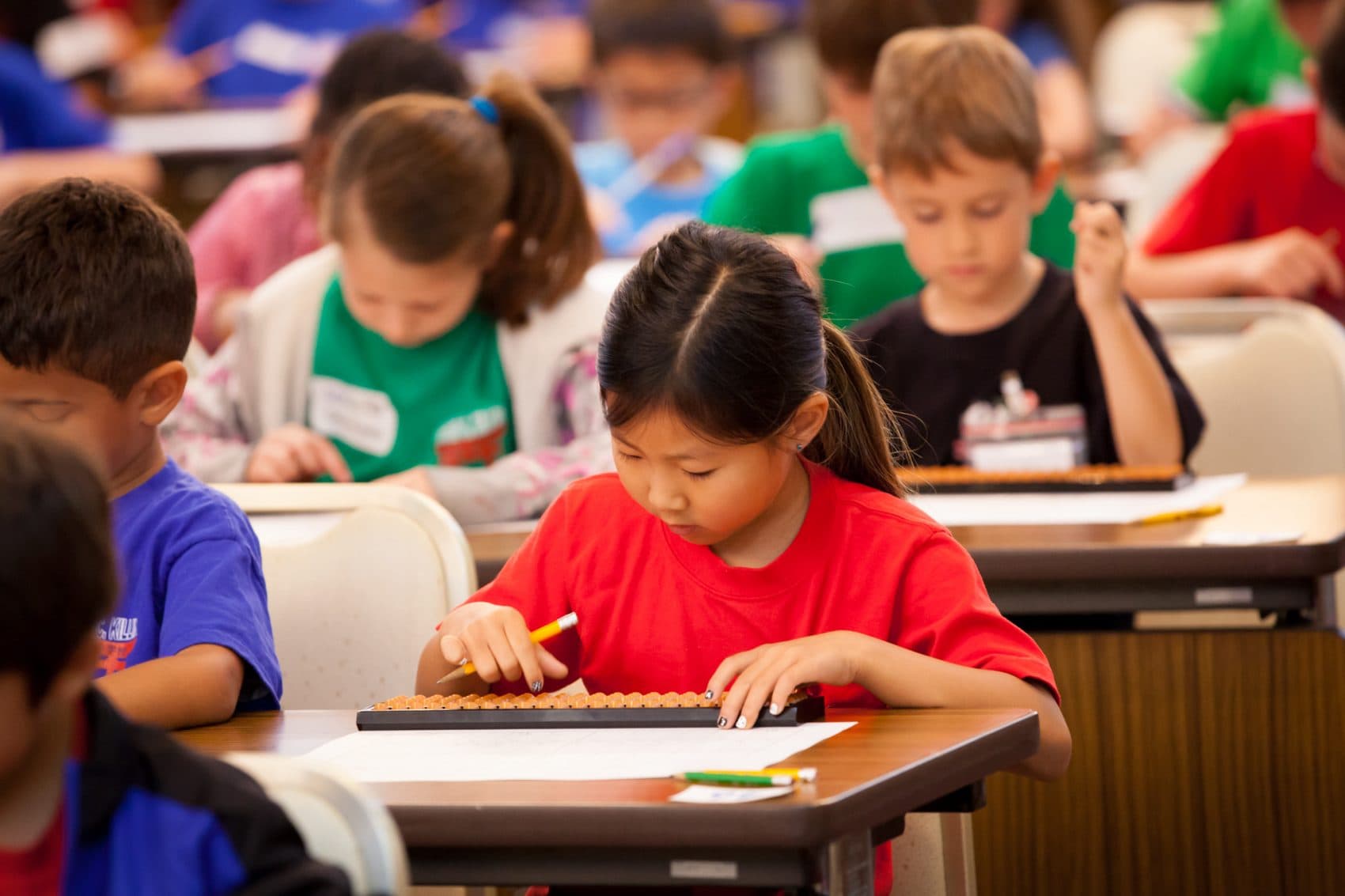 The truth is that traditional report cards rarely provide accurate assessments of student learning, writes Mike Kalin. (DoDEA Pacific/Flickr)