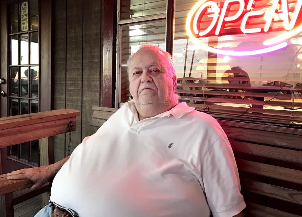Harris Cheramie owns the Leeville Seafood restaurant. He says routine flooding and a downturn in the oil and gas industry have hurt his business. (Peter O'Dowd/Here & Now)