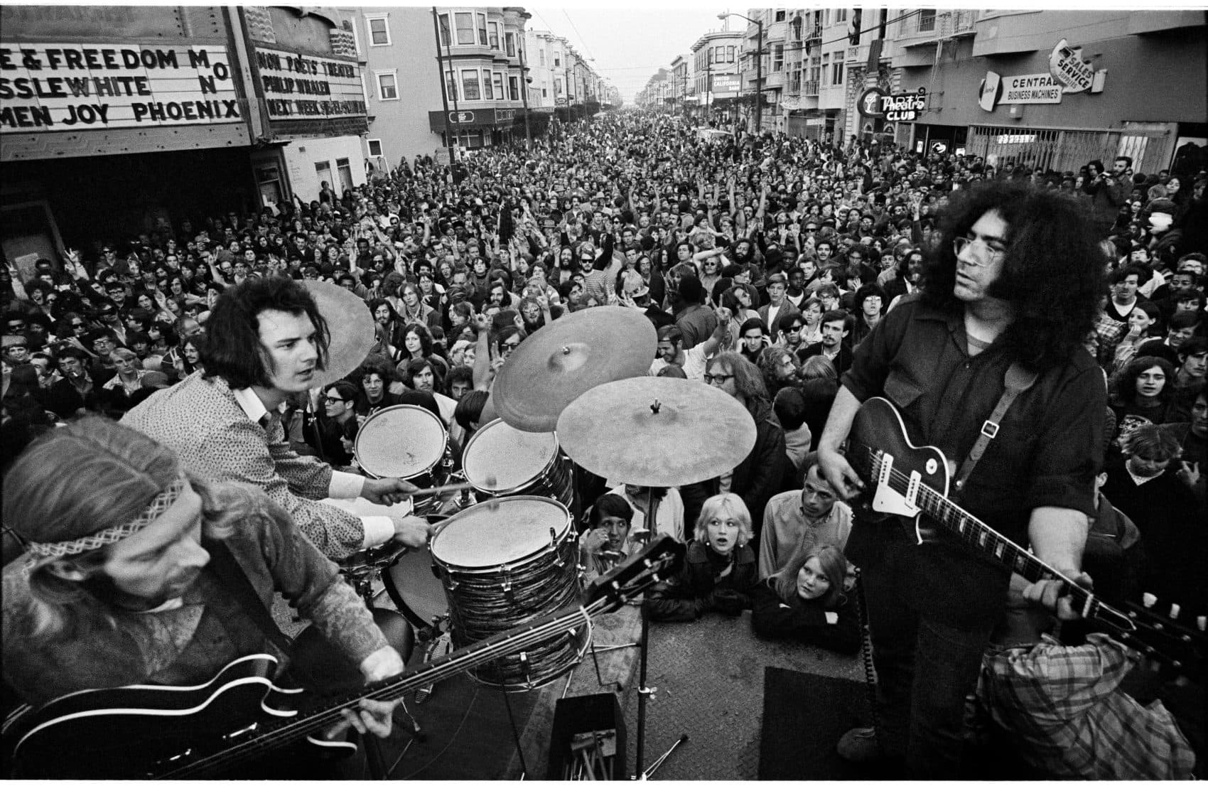 The Grateful Dead performing on Haight Street March 3, 1968. Left to right: Phil Lesh, Bill Kreutzmann and Jerry Garcia. (Courtesy Jim Marshall Photography LLC)
