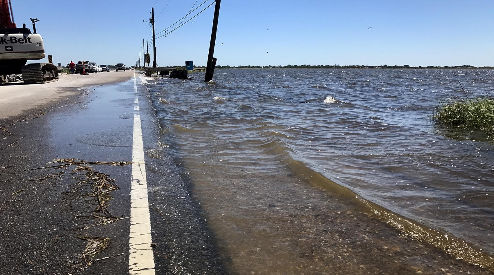The road leading to Isle de Jean Charles, La., is known to flood in perfect weather. (Peter O'Dowd/Here & Now)