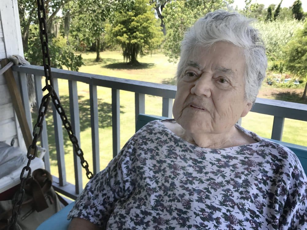 Denecia Billiot, who is in her 90s, says she will reluctantly leave the island where she and her husband Wenceslaus grew up. (Peter O'Dowd/Here &amp; Now)