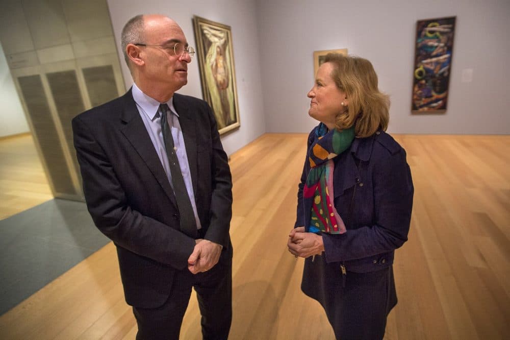 MFA director Matthew Teitelbaum speaks with Art of the Americas chair Elliot Bostwick Davis in the Lane Galleries. (Jesse Costa/WBUR)