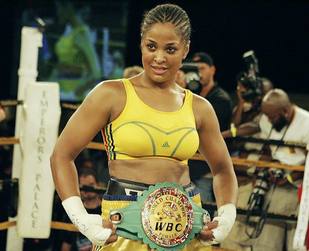Lalia Ali (USA) poses with the WBC/WIBA Super Middleweight World Title belt after defeating Gwendolyn O'Neil (Guyana) in Johannesburg, South Africa. (Lefty Shivambu/Gallo Images)