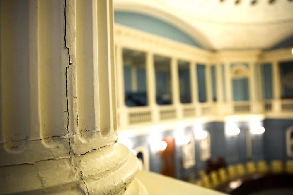A crack runs down the side of one of the balcony columns in the Massachusetts State House's Senate Chamber. (Robin Lubbock/WBUR)
