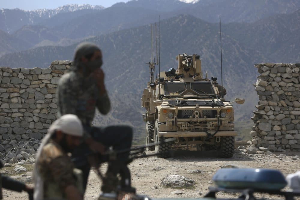 U.S. forces and Afghan security police are seen in Asad Khil near the site of a U.S. bombing in the Achin district of Jalalabad, east of Kabul, Afghanistan, Saturday, April 17, 2017. (Rahmat Gul/AP)