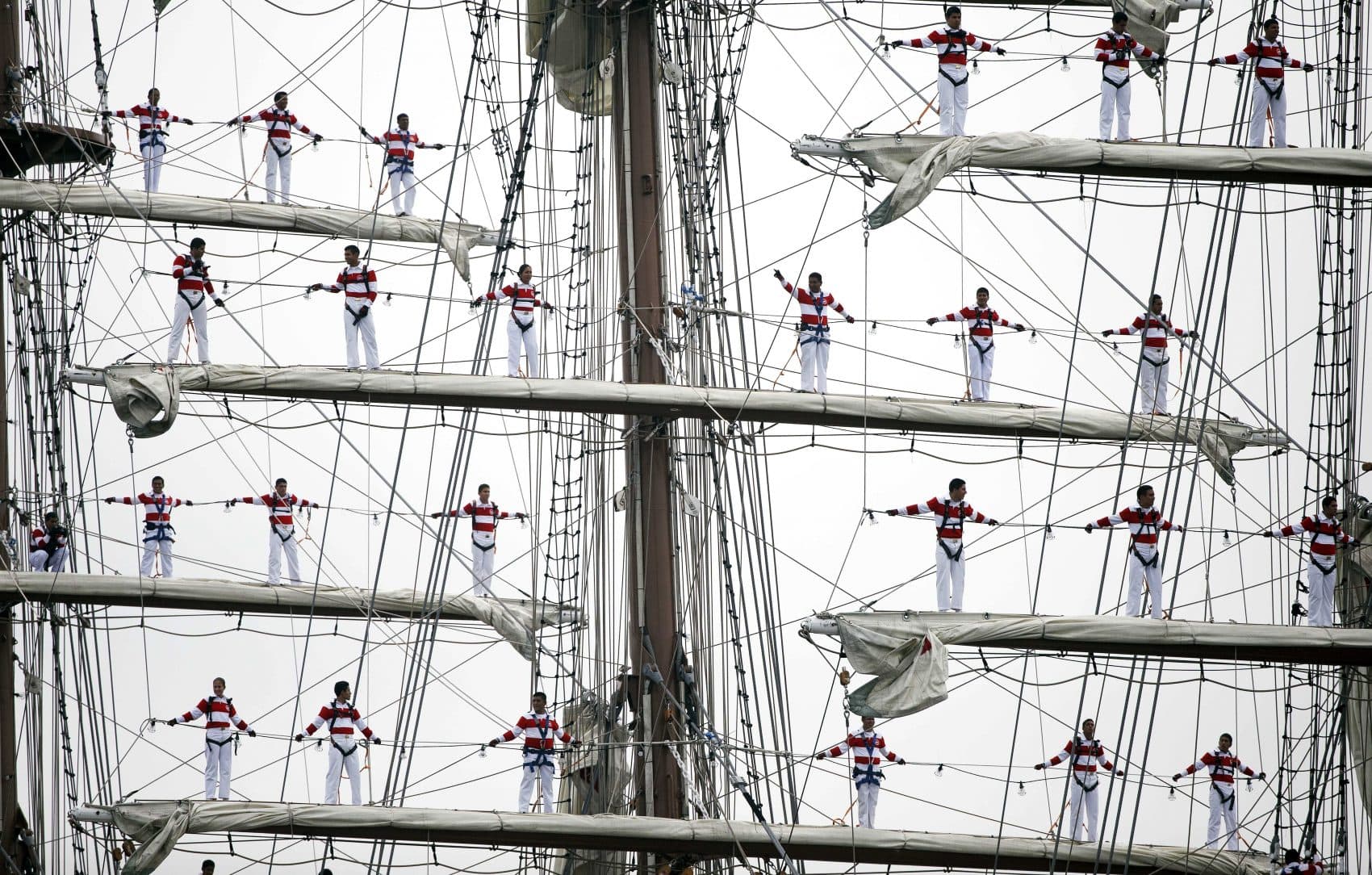 Sailors man the rigging on the Peruvian Navy tall ship Union during Sail Boston's Parade of Sail on Saturday. (Michael Dwyer/AP)