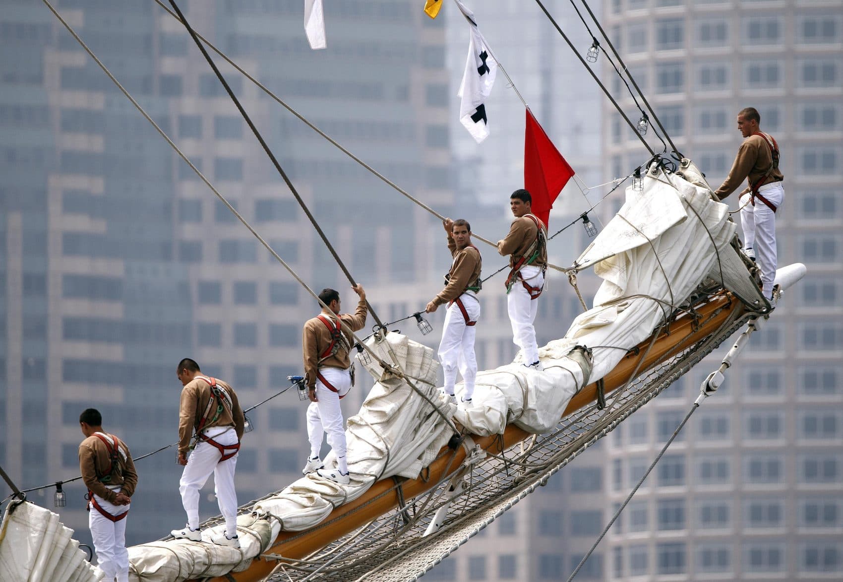 Sailors man the bowsprit on the Chilean Navy tall ship Esmerelda during Sail Boston's Parade of Sail on Saturday. (Michael Dwyer/AP)
