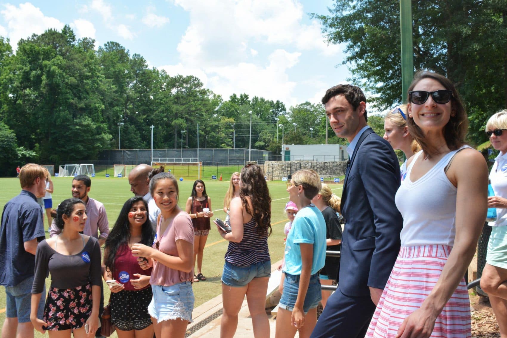 Democrat Jon Ossoff and his fiancée, Alisha Kramer, arrive at a "Rock Your Ossoff!" rally aimed at getting millennials to vote. (Sam Whitehead/GPB)