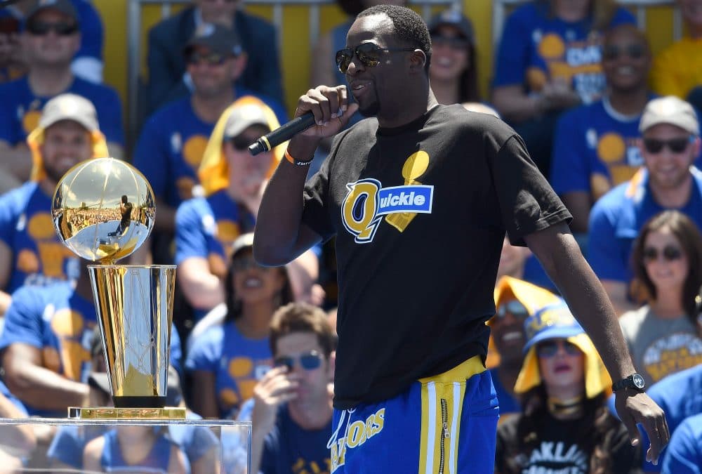 Draymond Green of the Golden State Warriors took a shot at the Cleveland Cavaliers with this t-shirt. (Thearon W. Henderson/Getty Images)