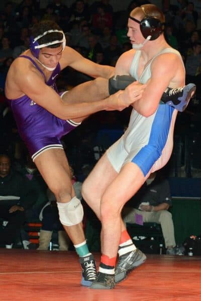 Riley Lefever (R) attempts to take Bobby Steveson (L) down in the 2013 IHSAA State Championships (photo credit Nancy Lefever)