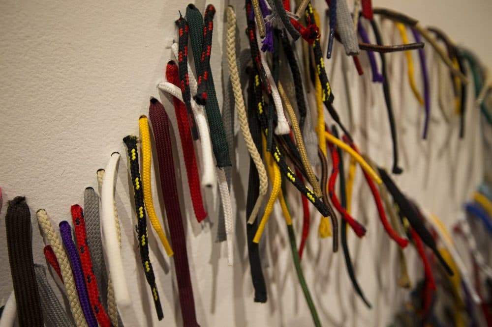Close up of the shoelace work by Nari Ward for his work, &quot;We the People.&quot; (Jesse Costa/WBUR)