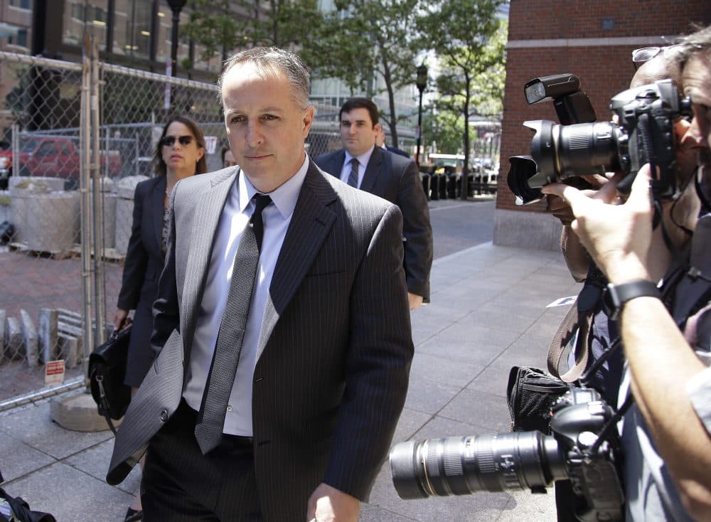 Barry Cadden, president of the New England Compounding Center, followed by members of his legal team, arrive at the federal courthouse in Boston for his sentencing. (Stephan Savoia/AP)