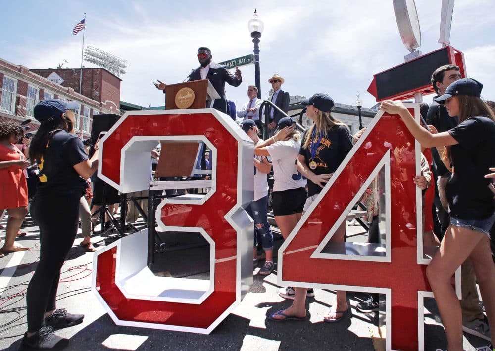 Retired Boston Red Sox designated hitter David Ortiz addresses the crowd that gathered for the renaming ceremony for part of Yawkey Way in honor of Ortiz. (Charles Krupa/AP)