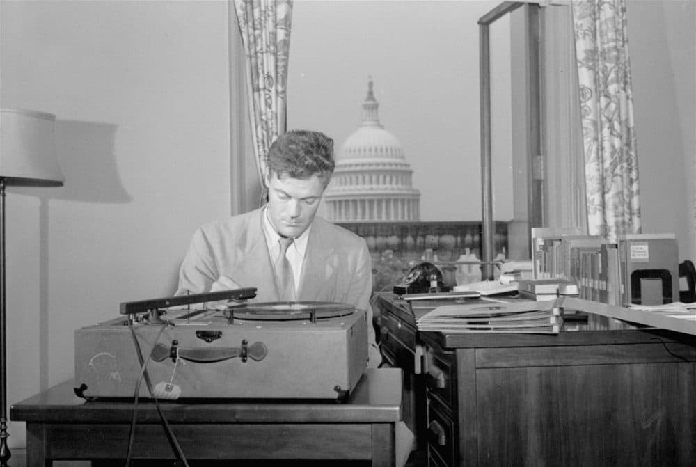 Robert Lowell, Jr., Library of Congress consultant in poetry in English, listens to a playback of a new recording of poetry in his office in Washington, DC, August 31, 1948. Lowell is supervising the preparation of a series of recordings of contemporary poetry in a project made possible by a grant of funds by the Bollingen Foundation to the Library. (AP Photo)