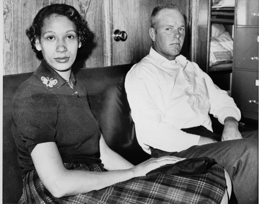 Richard P. Loving and his wife, Mildred, pose in this Jan. 26, 1965, file photograph. Residents of Caroline County, Virginia, the Lovings married in Washington, D.C., in 1958. Upon their return to Virginia, the interracial couple was convicted under the state's law that banned mixed marriages. They eventually won a U.S. Supreme Court decision in June 1967 that overturned laws prohibiting interracial unions. (AP)