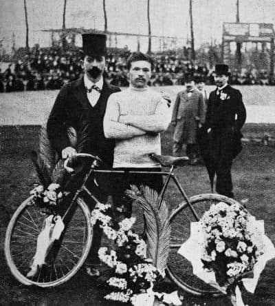 Maurice Garin (center), after winning a one-day professional bicycle race from Paris to Roubaix, circa April 1898. (Popperfoto/Getty Images)