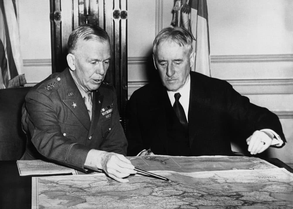General George C. Marshall, left, then U.S. Army Chief of Staff, and Secretary of War Henry L. Stimson held one of their frequent strategy conferences in Washington, D.C. in 1942. (AP Photo)