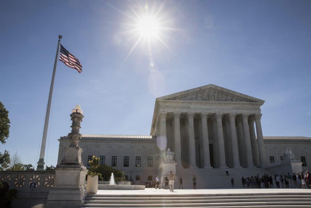 The back and forth on President Trump's travel ban has shown that his long game on immigration policy is not actually grounded in legal changes, writes Kari Hong. Pictured: People visit the Supreme Court in Washington, Monday, June 26, 2017, as justices issued their final rulings for the term, in Washington. (J. Scott Applewhite/AP)