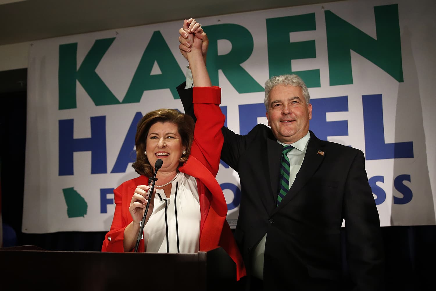 Republican candidate for Georgia's 6th District Congressional seat Karen Handel celebrates with her husband Steve as she declares victory during an election-night watch party Tuesday, June 20, 2017, in Atlanta. (John Bazemore/AP)