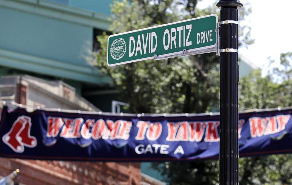 Tom Keane: " there’s something almost poetic about how the old now segues into the new." Pictured: A new "David Ortiz Drive" street sign outside Fenway Park, June 22, 2017. (Charles Krupa/AP)