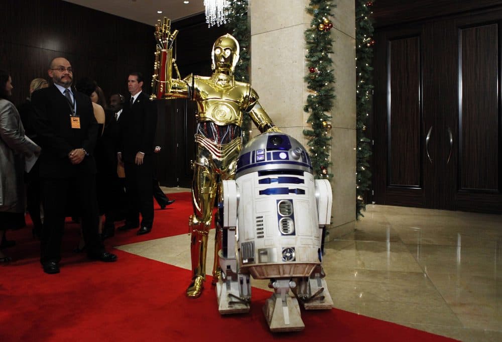 &quot;Star Wars&quot; characters C-3PO, left, and R2D2 arrive at the American Cinematheque Award gala honoring Samuel L. Jackson in Beverly Hills, Calif. in Dec. 2008. (Matt Sayles/AP)
