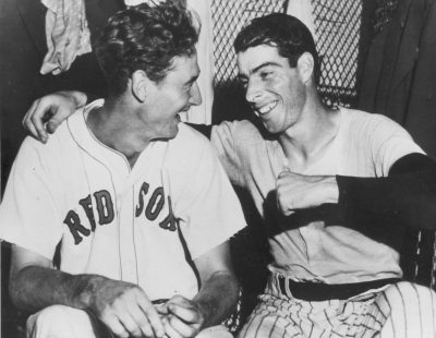 Joe DiMaggio (right) congratulates Ted Williams (left) whose ninth inning homer defeated the national league All Stars, 7-5, in Detroit on July 8, 1941. (AP)