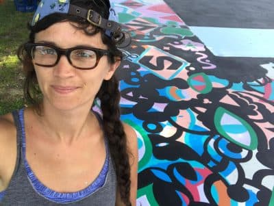 Maria Molteni at her &quot;Hard In the Paint&quot; basketball court mural at Boston's Harambee Park. (Courtesy Maria Molteni)