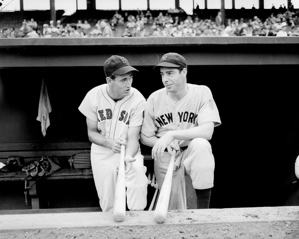 Ted Williams (left) and Joe DiMaggio (right) speak after a Red Sox-Yankees game in Boston on August 18, 1942 (Abe Fox/AP)