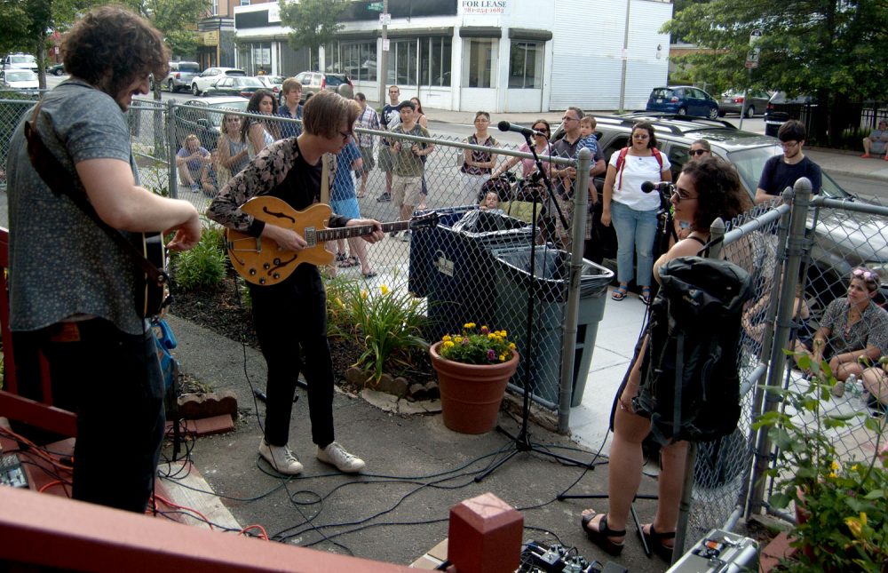 The Solars play on Centre Street during JP Porchfest in Boston's Jamaica Plain neighborhood. (Greg Cook)