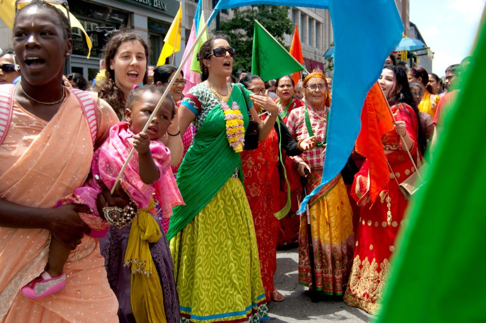 Dancing down Boston's Boylston Street during the Festival of Chariots—or Ratha Yatra. (Greg Cook/WBUR)