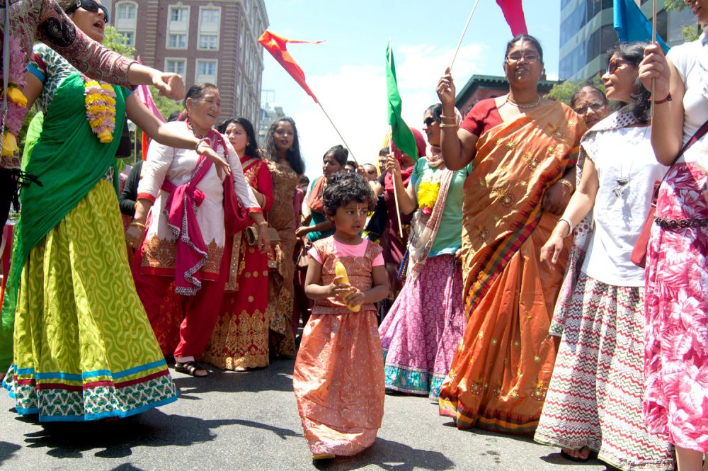 Dancing down Boston's Boylston Street during the Festival of Chariots—or Ratha Yatra. (Greg Cook/WBUR)