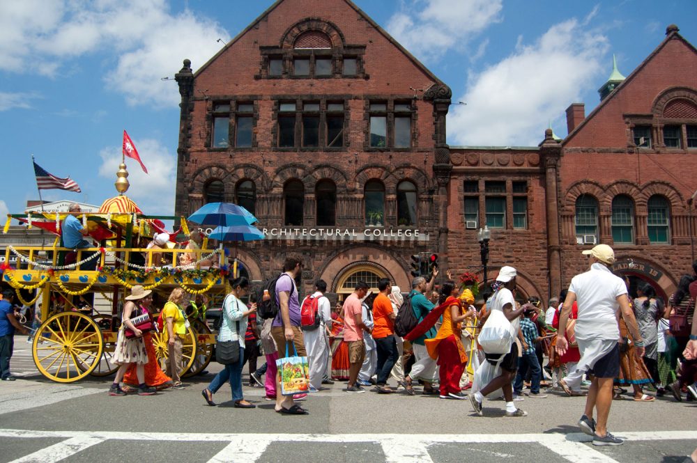 The Festival of Chariots parades down Boylston Street. (Greg Cook/WBUR)