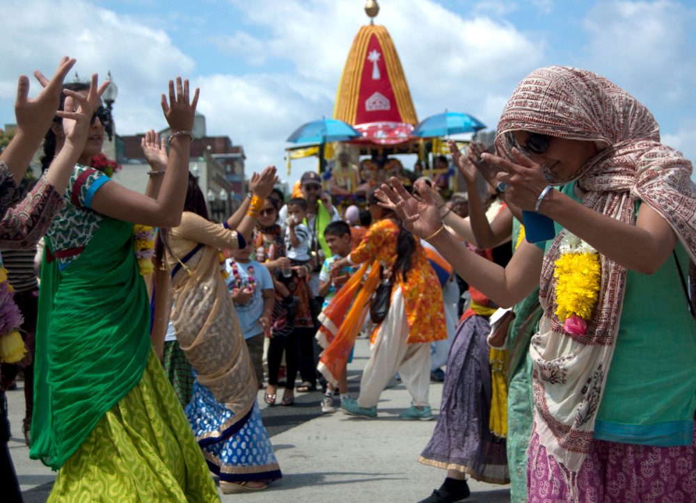 Dancing down Boston's Boylston Street during the Festival of Chariots — or Ratha Yatra. (Greg Cook/WBUR)